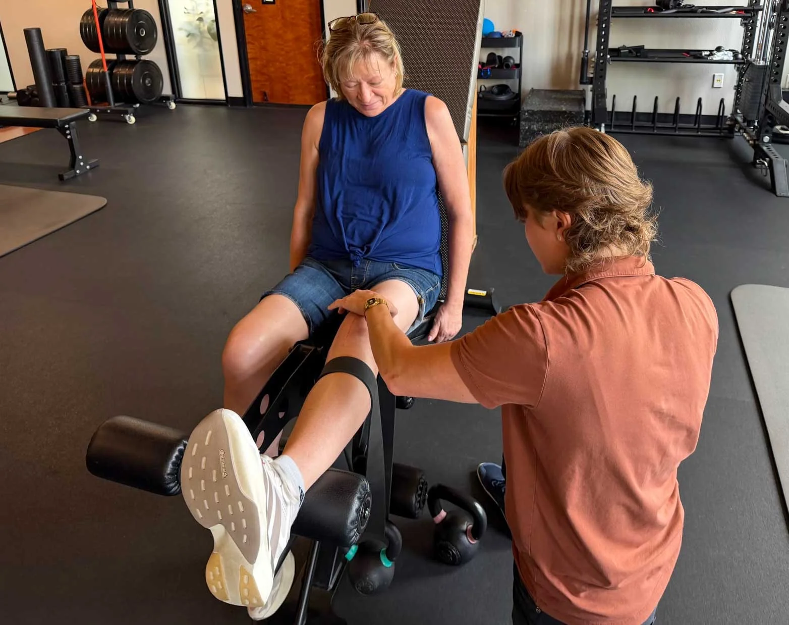 A knee extension movement demonstrated during a Move Better assessment